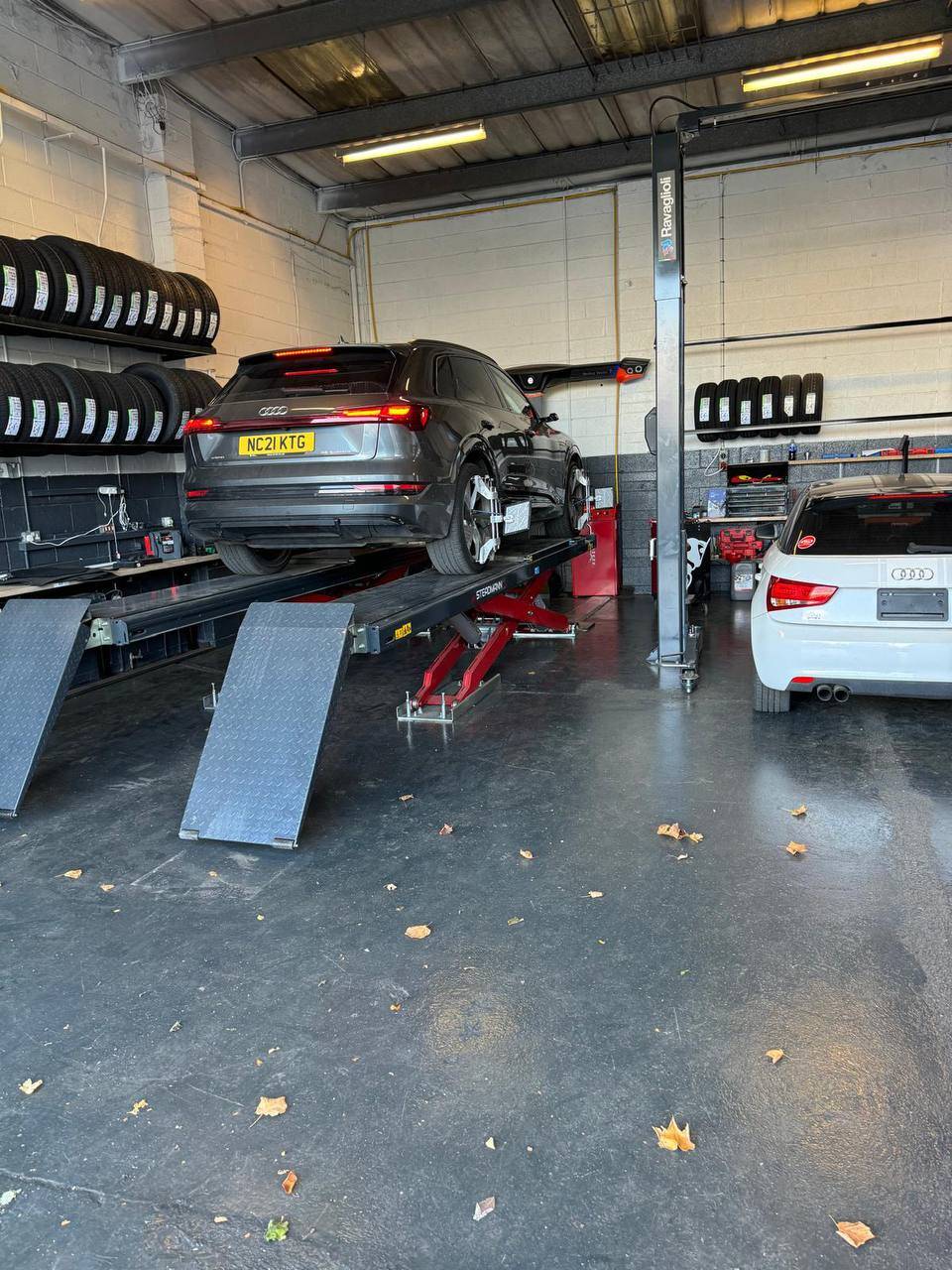 Expert mechanic working on vehicle at MJN Tyres Kylemore Dublin